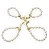 Перлинні наручники та поножі LOCKINK Pearl Bondage & Restraint Set 1 Зображення Перлинні наручники та поножі LOCKINK Pearl Bondage & Restraint Set
